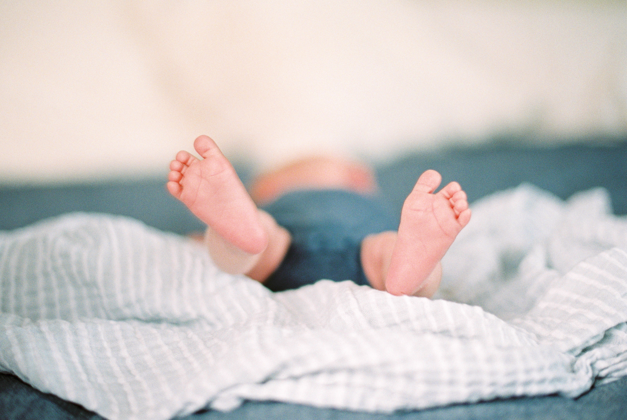 detail shot of tiny newborn baby feet